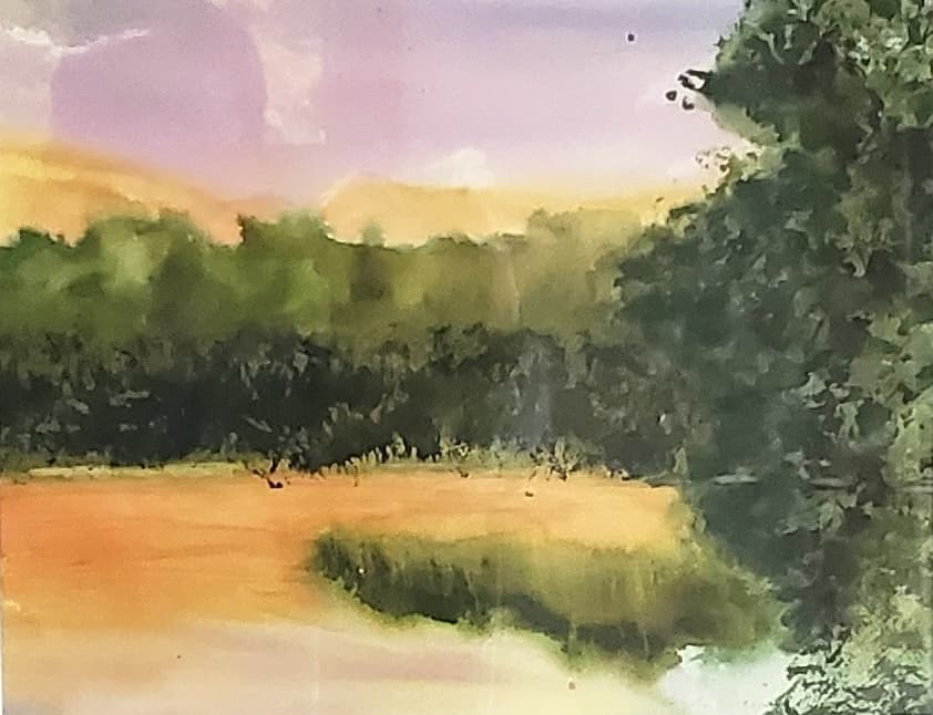 Impressionistic landscape painting of a golden field and green trees under a soft purple sky.